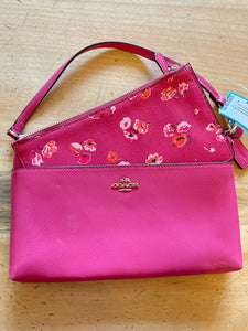 Coach hot pink wristlet with pop up floral pouch